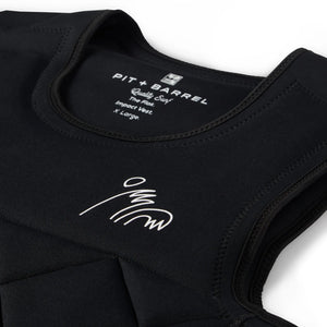 Black | Black competition wake surf vest,  detail of stitching and logo. 