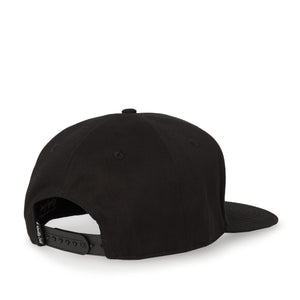 Back 3/4 view of black 5 panel snapback hat showing black with white text tag saying 'quality surf'.