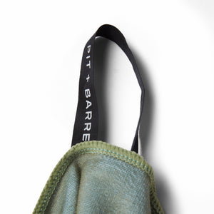 Lake Vibes | detail view of hanging tag with 'Pit +Barrel' logo printed on black with white text. 