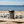 Grey Koozie on Towel at Beach