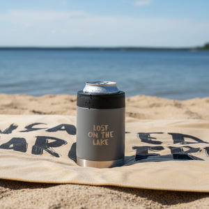 Grey Koozie on Towel at Beach